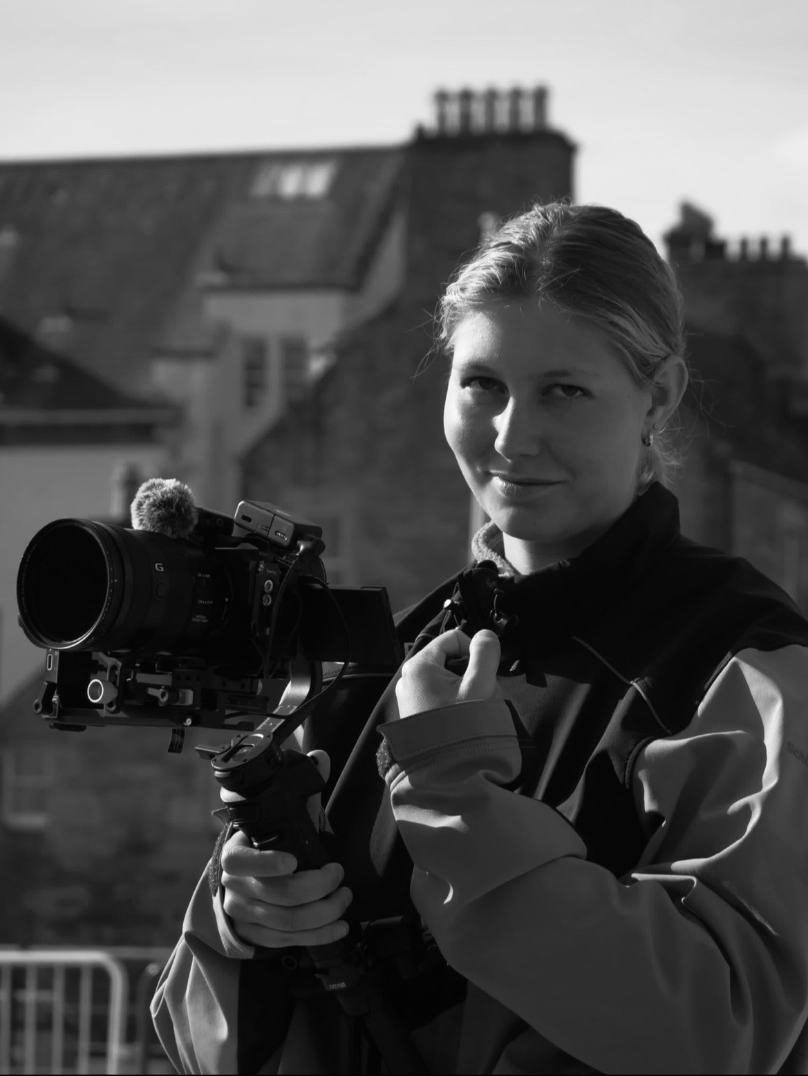 Anja operating a camera on a gimbal outdoors